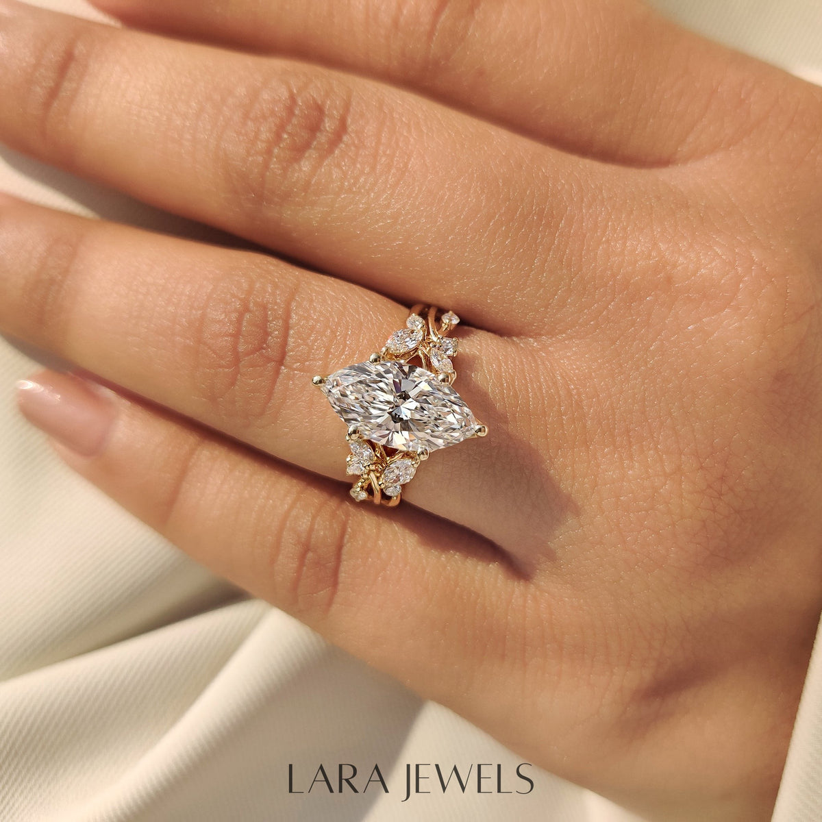 Lab grown marquise engagement ring in Tulip Setting, available in Silver. IGI certified, ethically sourced, handcrafted at Lara Jewels.