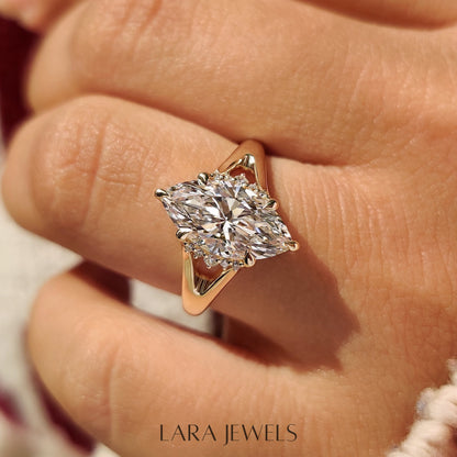 Lab grown marquise engagement ring in Hidden Flower Pink Ruby, available in Silver. IGI certified, ethically sourced, handcrafted at Lara Jewels.