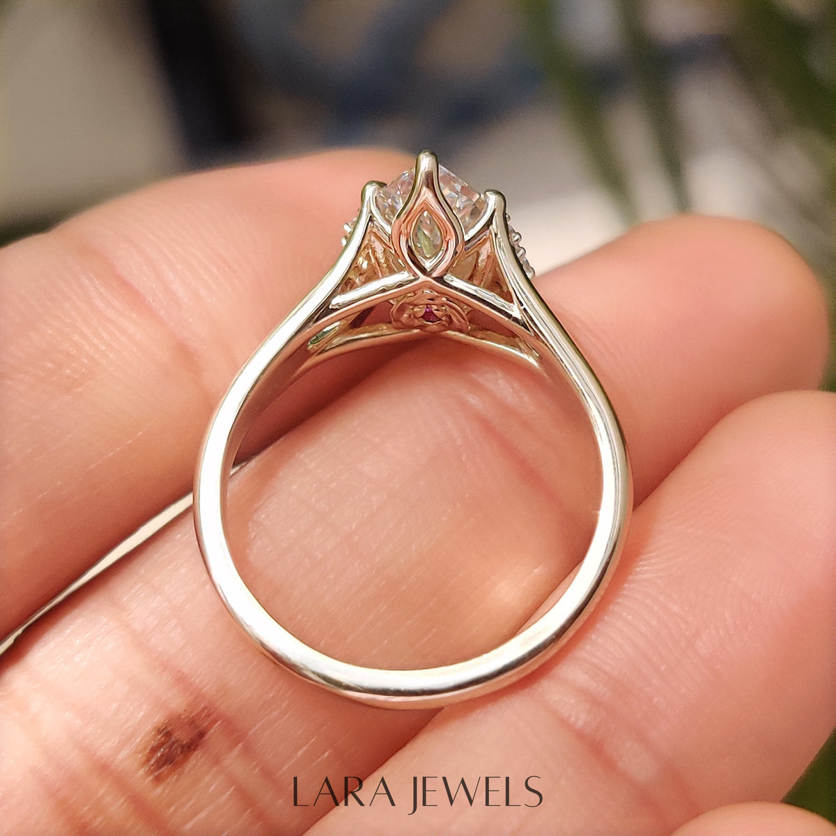 Lab grown marquise engagement ring in Hidden Flower Pink Ruby, available in Silver. IGI certified, ethically sourced, handcrafted at Lara Jewels.