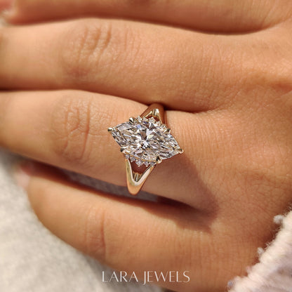 Lab grown marquise engagement ring in Hidden Flower Pink Ruby, available in Silver. IGI certified, ethically sourced, handcrafted at Lara Jewels.