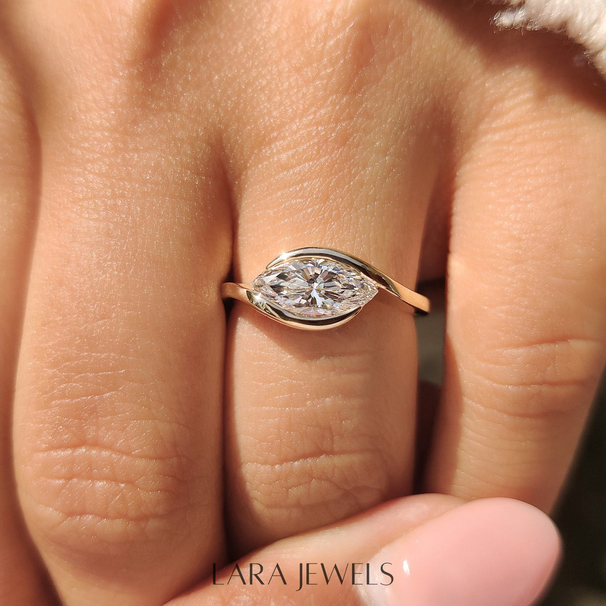 Lab grown marquise engagement ring in Bypass Setting, available in Silver. IGI certified, ethically sourced, handcrafted at Lara Jewels.