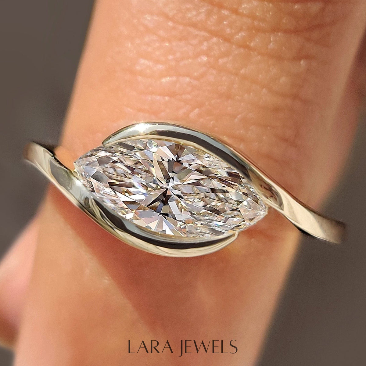 Lab grown marquise engagement ring in Bypass Setting, available in Silver. IGI certified, ethically sourced, handcrafted at Lara Jewels.