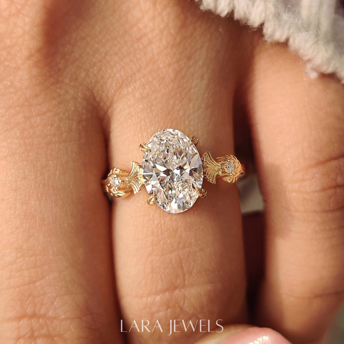 Lab grown oval engagement ring in Leaf Style Prong, available in Silver. IGI certified, ethically sourced, handcrafted at Lara Jewels.