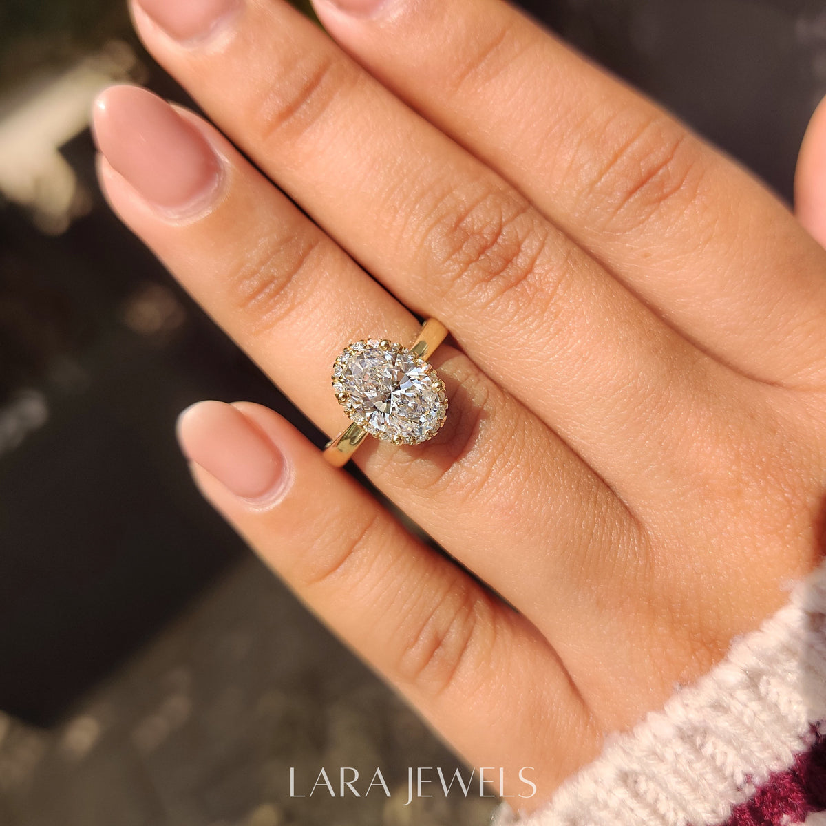 Lab grown oval engagement ring in Round Cut Diamond Basket Setting, available in Silver. IGI certified, ethically sourced, handcrafted at Lara Jewels.