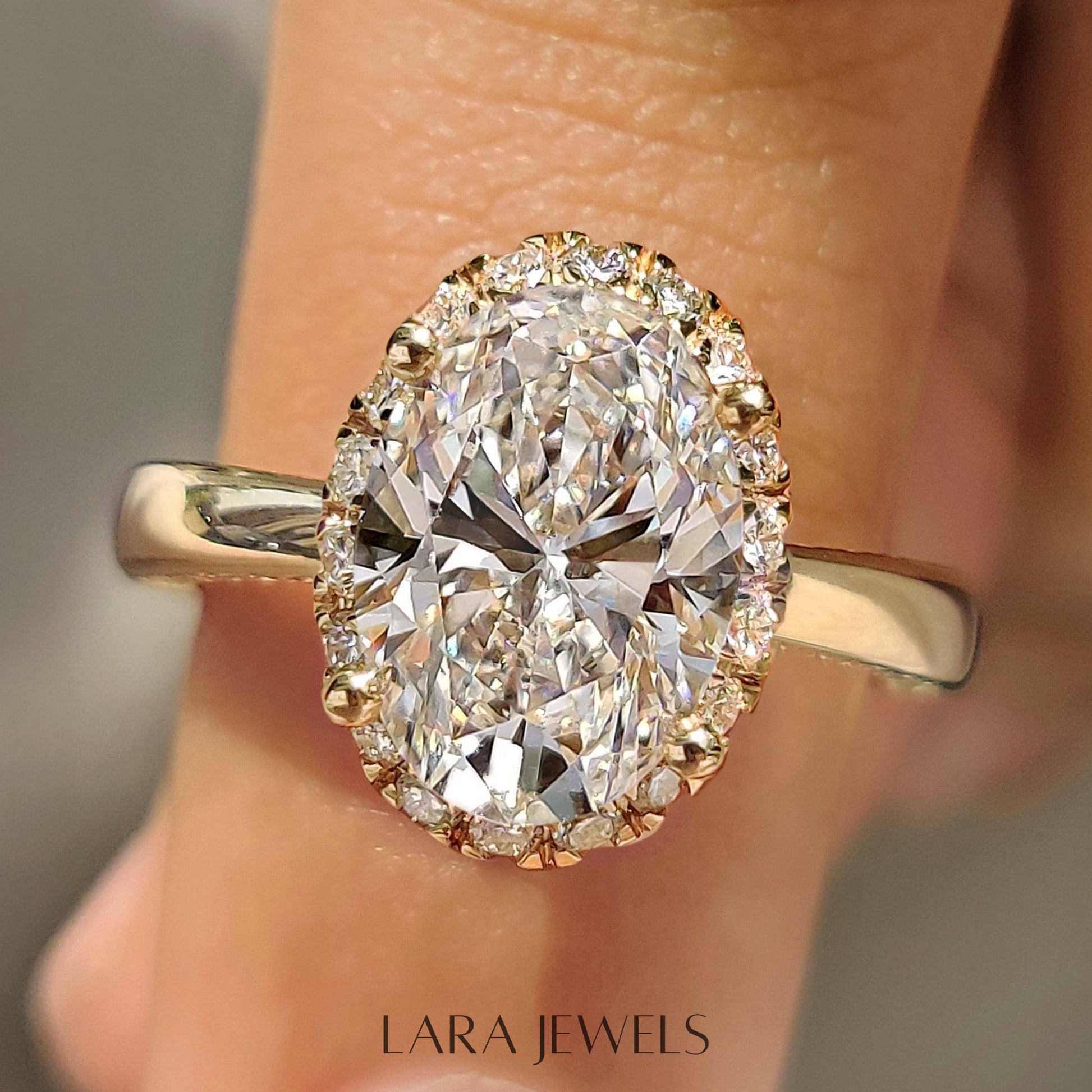 Lab grown oval engagement ring in Round Cut Diamond Basket Setting, available in Silver. IGI certified, ethically sourced, handcrafted at Lara Jewels.