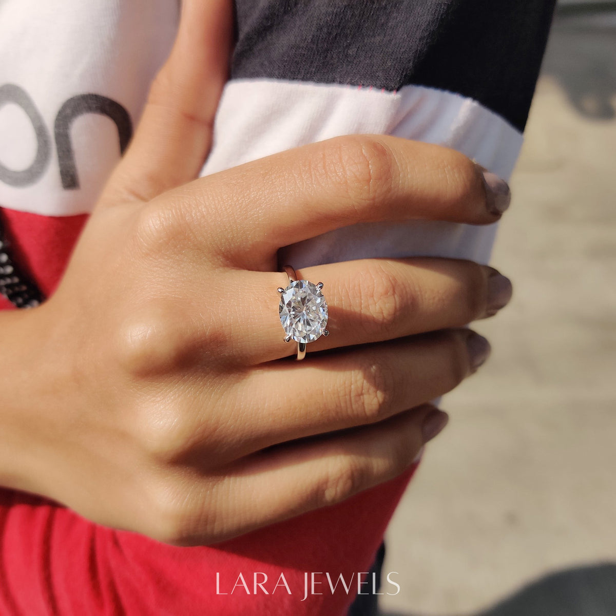 Lab grown oval engagement ring in Lara Jewels setting, available in Silver. IGI certified, ethically sourced, handcrafted at Lara Jewels.