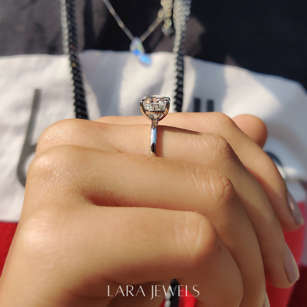 Lab grown oval engagement ring in Lara Jewels setting, available in Silver. IGI certified, ethically sourced, handcrafted at Lara Jewels.