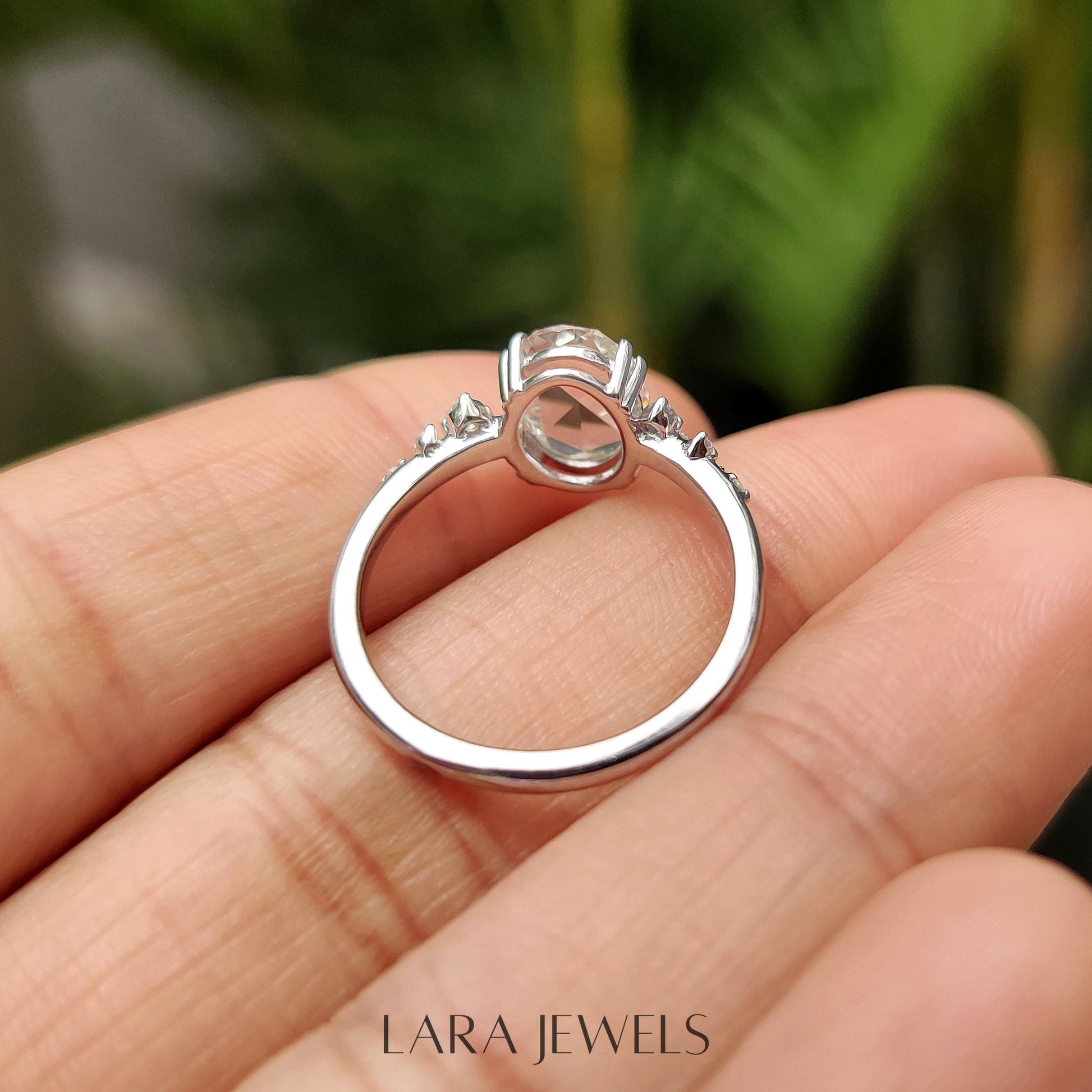 Lab grown oval engagement ring in Cluster Setting, available in Silver. IGI certified, ethically sourced, handcrafted at Lara Jewels.