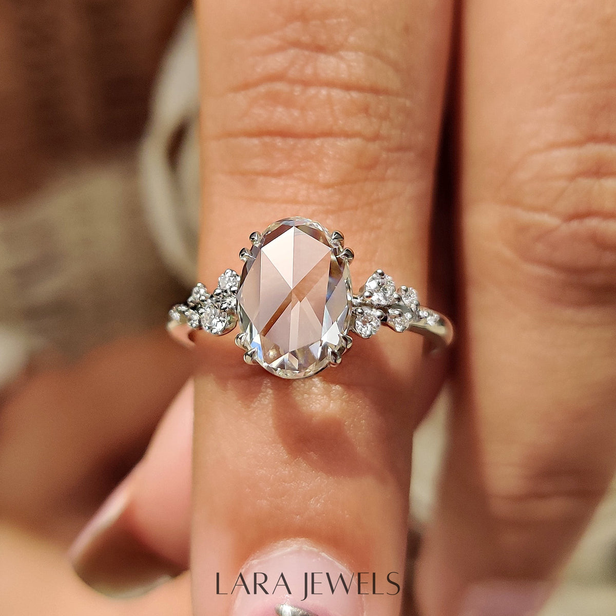 Lab grown oval engagement ring in Cluster Setting, available in Silver. IGI certified, ethically sourced, handcrafted at Lara Jewels.
