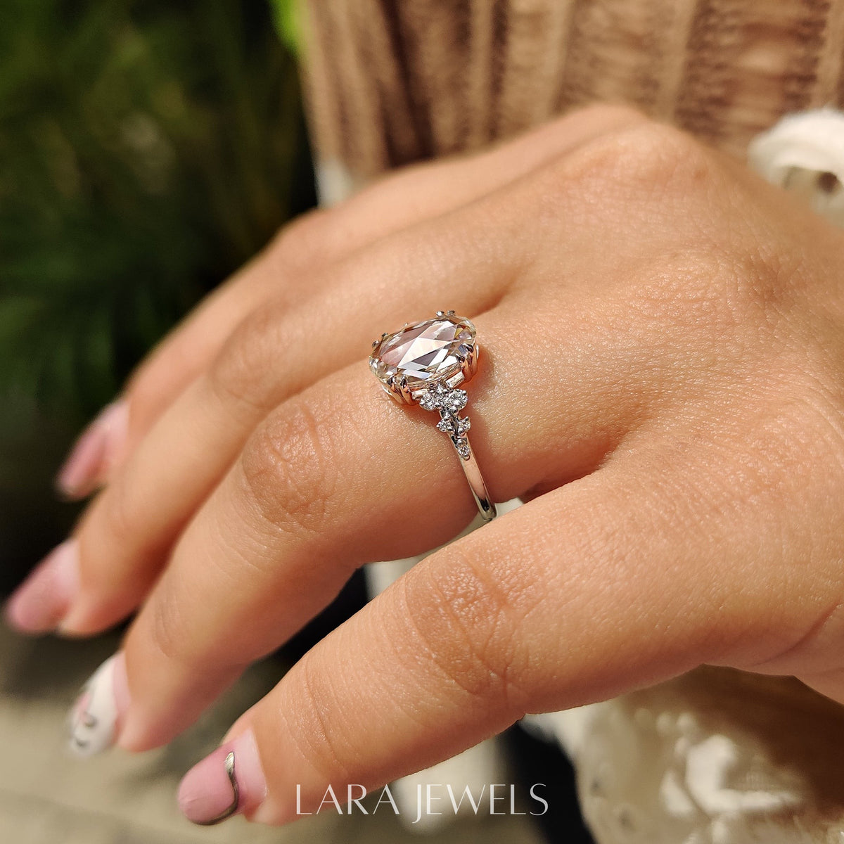 Lab grown oval engagement ring in Cluster Setting, available in Silver. IGI certified, ethically sourced, handcrafted at Lara Jewels.