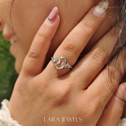 Lab grown oval engagement ring in Cluster Setting, available in Silver. IGI certified, ethically sourced, handcrafted at Lara Jewels.
