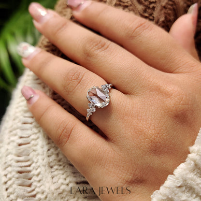 Lab grown oval engagement ring in Cluster Setting, available in Silver. IGI certified, ethically sourced, handcrafted at Lara Jewels.