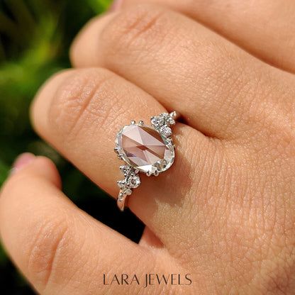 Lab grown oval engagement ring in Cluster Setting, available in Silver. IGI certified, ethically sourced, handcrafted at Lara Jewels.