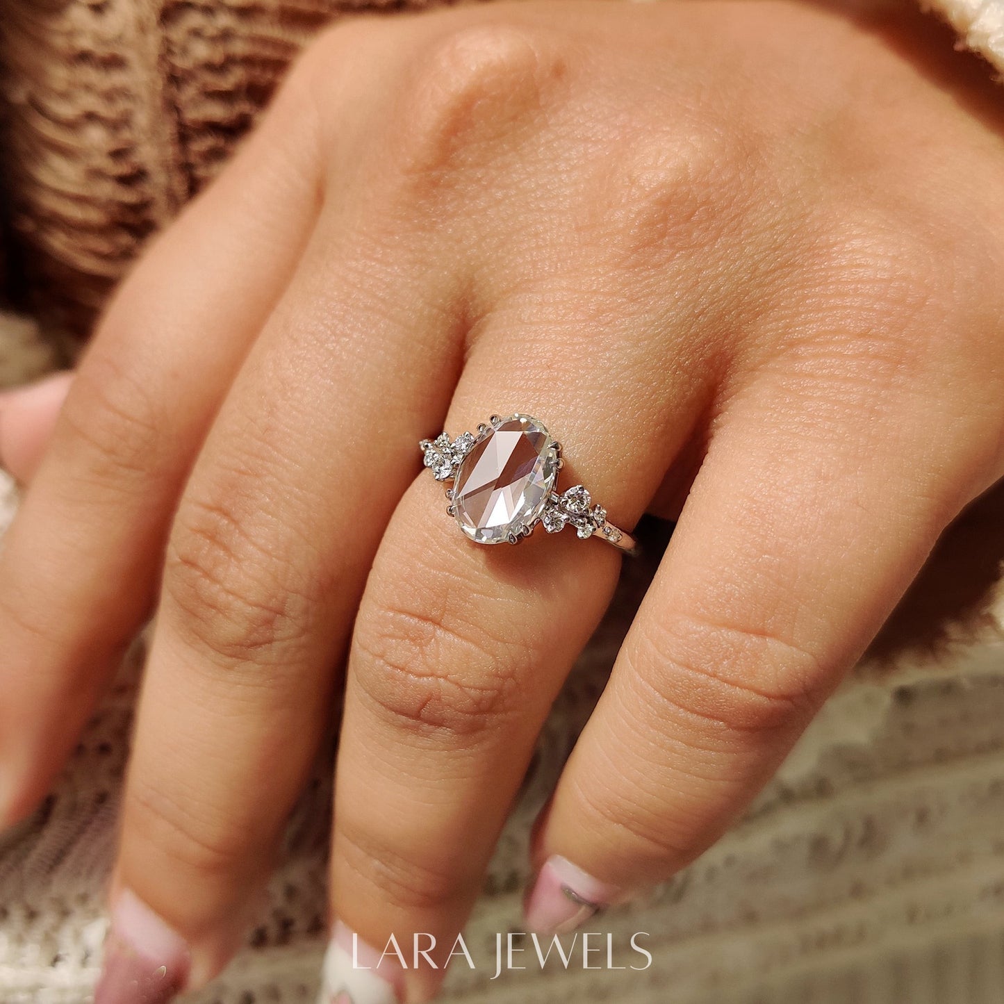 Lab grown oval engagement ring in Cluster Setting, available in Silver. IGI certified, ethically sourced, handcrafted at Lara Jewels.