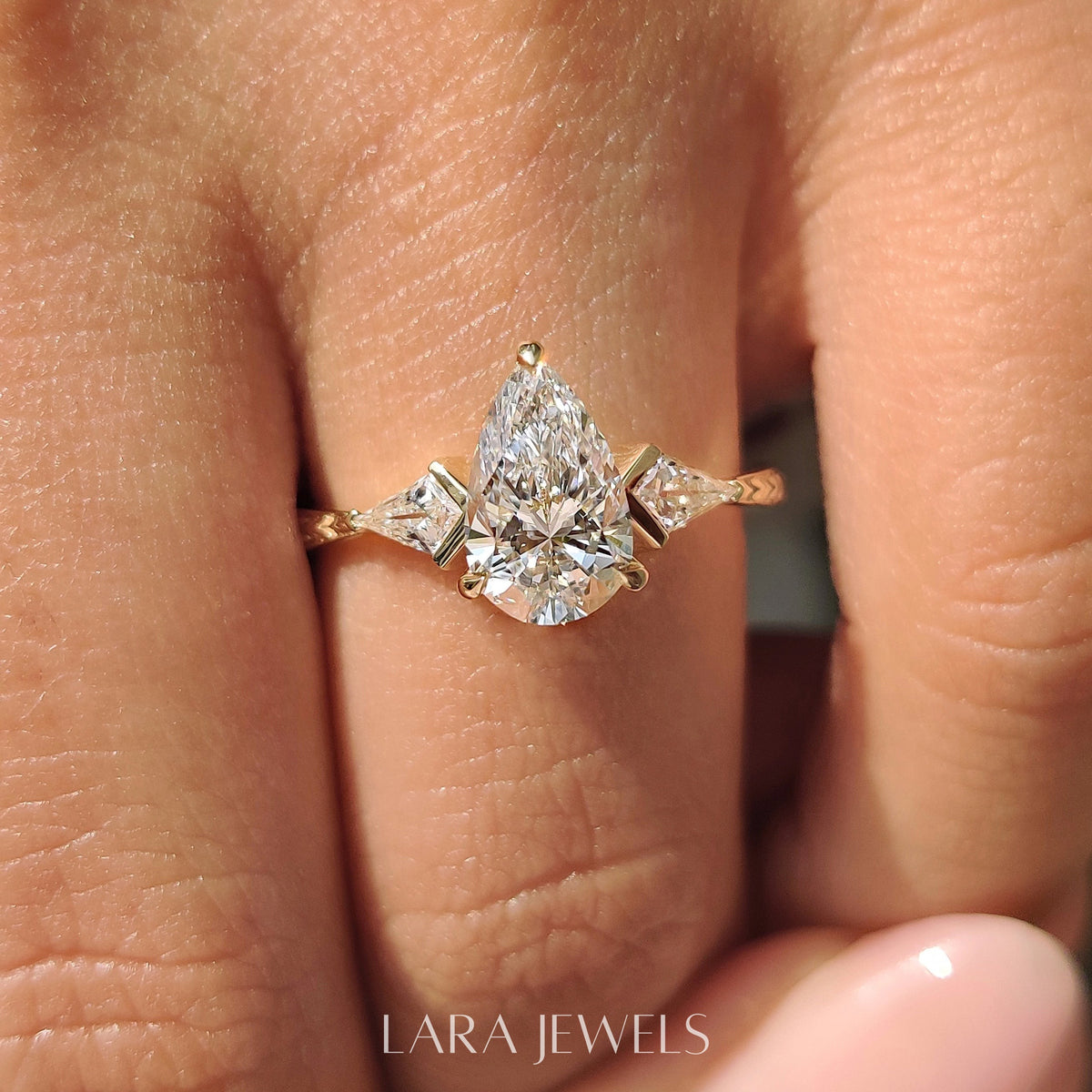 Lab grown pear engagement ring in Art Deco Band, available in Silver. IGI certified, ethically sourced, handcrafted at Lara Jewels.