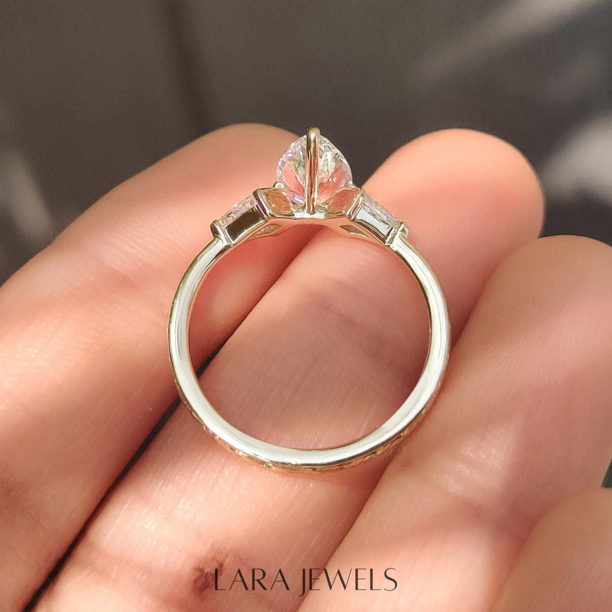 Lab grown pear engagement ring in Art Deco Band, available in Silver. IGI certified, ethically sourced, handcrafted at Lara Jewels.