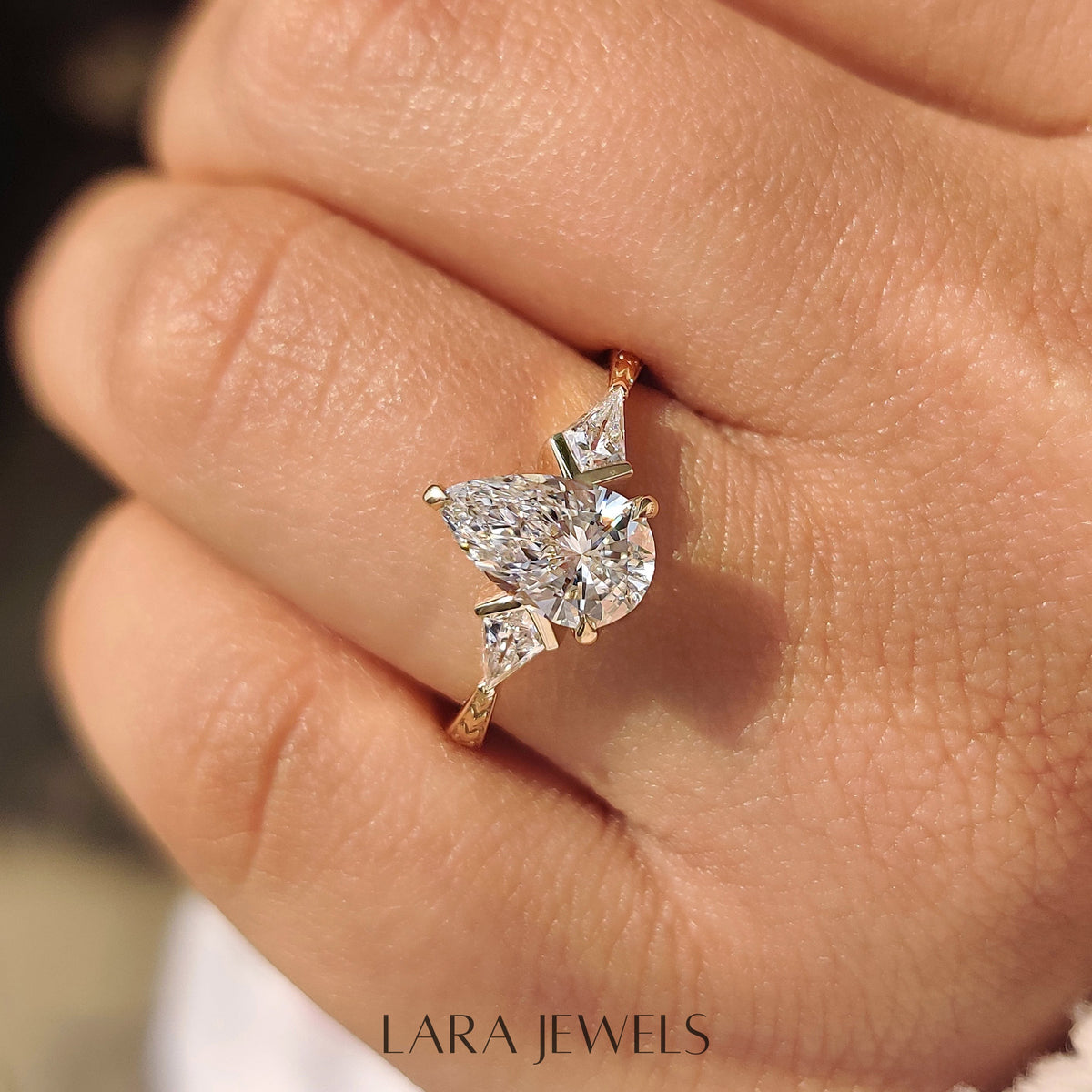 Lab grown pear engagement ring in Art Deco Band, available in Silver. IGI certified, ethically sourced, handcrafted at Lara Jewels.