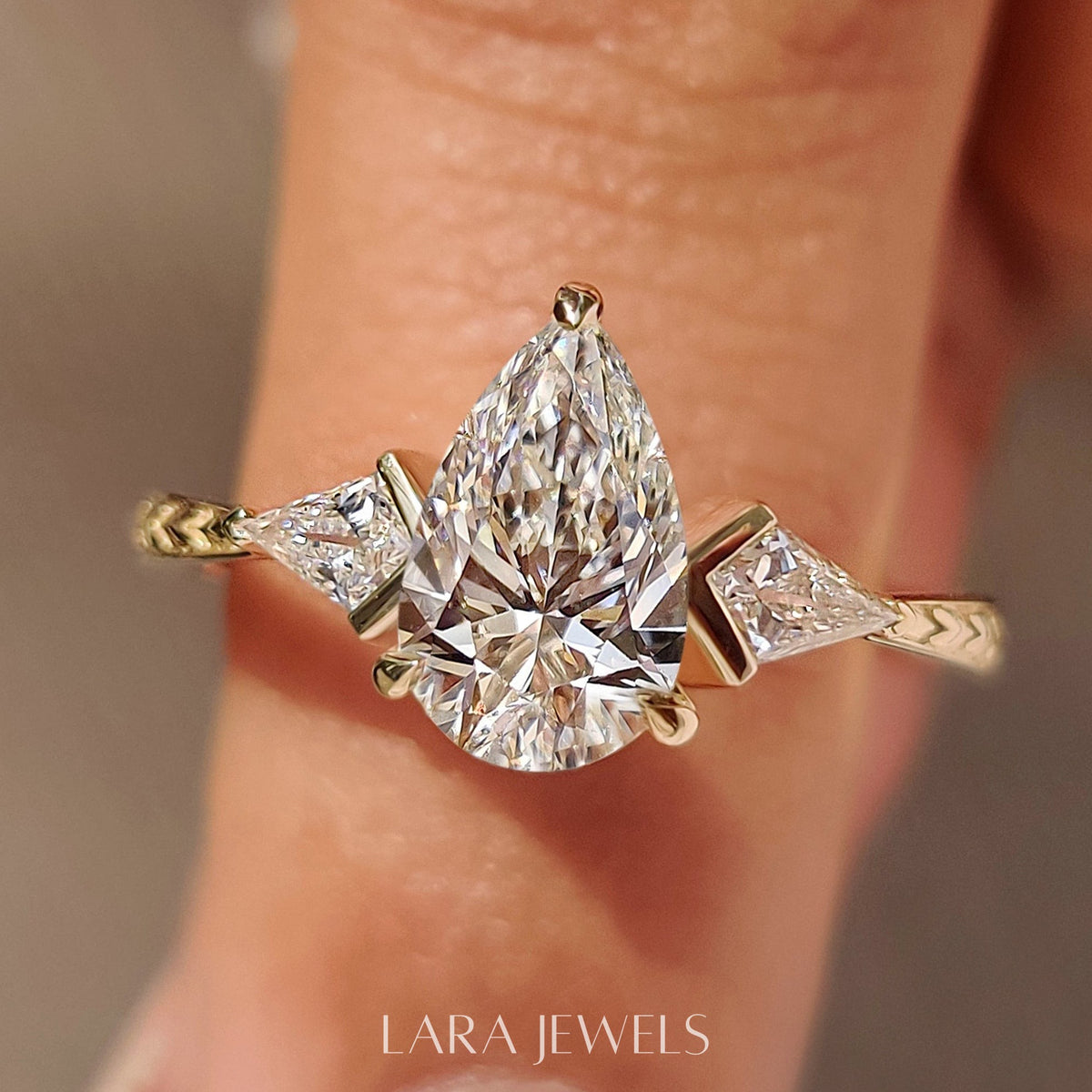 Lab grown pear engagement ring in Art Deco Band, available in Silver. IGI certified, ethically sourced, handcrafted at Lara Jewels.