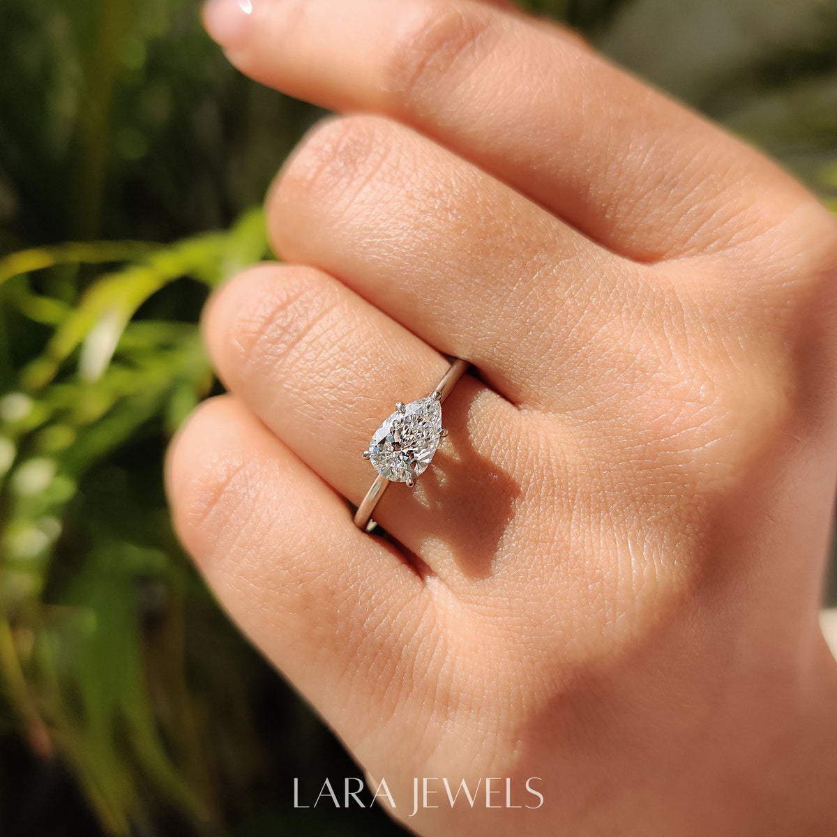 Lab grown pear engagement ring in Lara Jewels setting, available in Silver. IGI certified, ethically sourced, handcrafted at Lara Jewels.