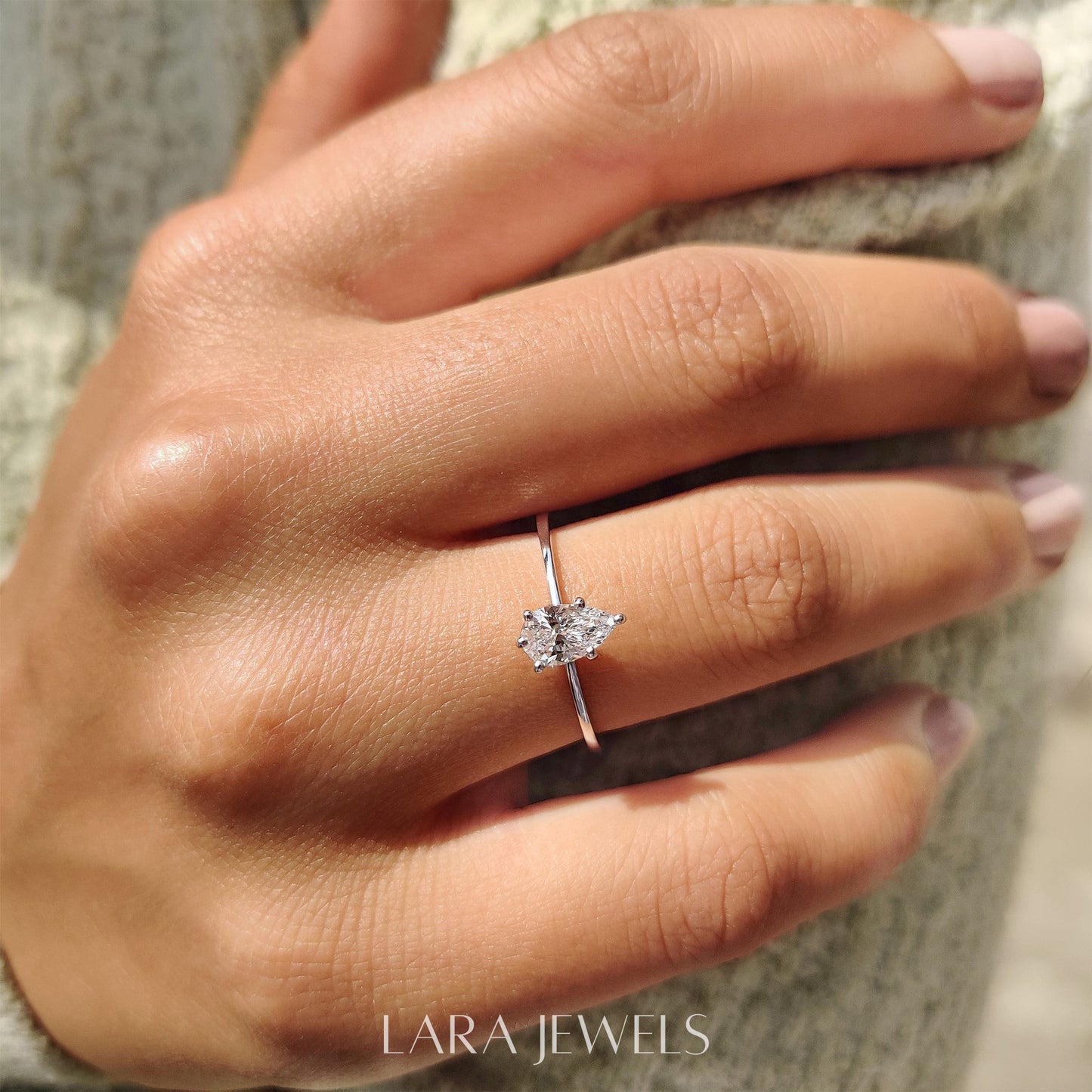 Lab grown pear engagement ring in Lara Jewels setting, available in Silver. IGI certified, ethically sourced, handcrafted at Lara Jewels.