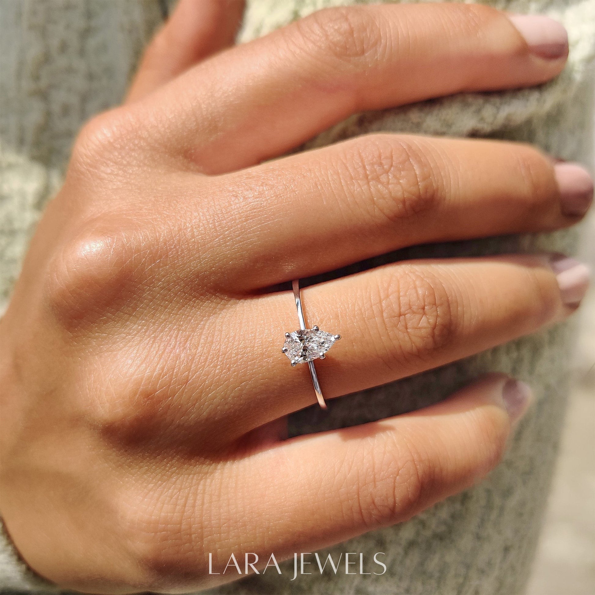 Lab grown pear engagement ring in Lara Jewels setting, available in Silver. IGI certified, ethically sourced, handcrafted at Lara Jewels.