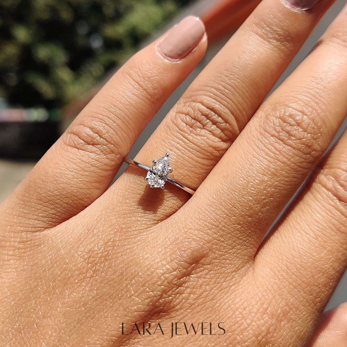 Lab grown pear engagement ring in Lara Jewels setting, available in Silver. IGI certified, ethically sourced, handcrafted at Lara Jewels.