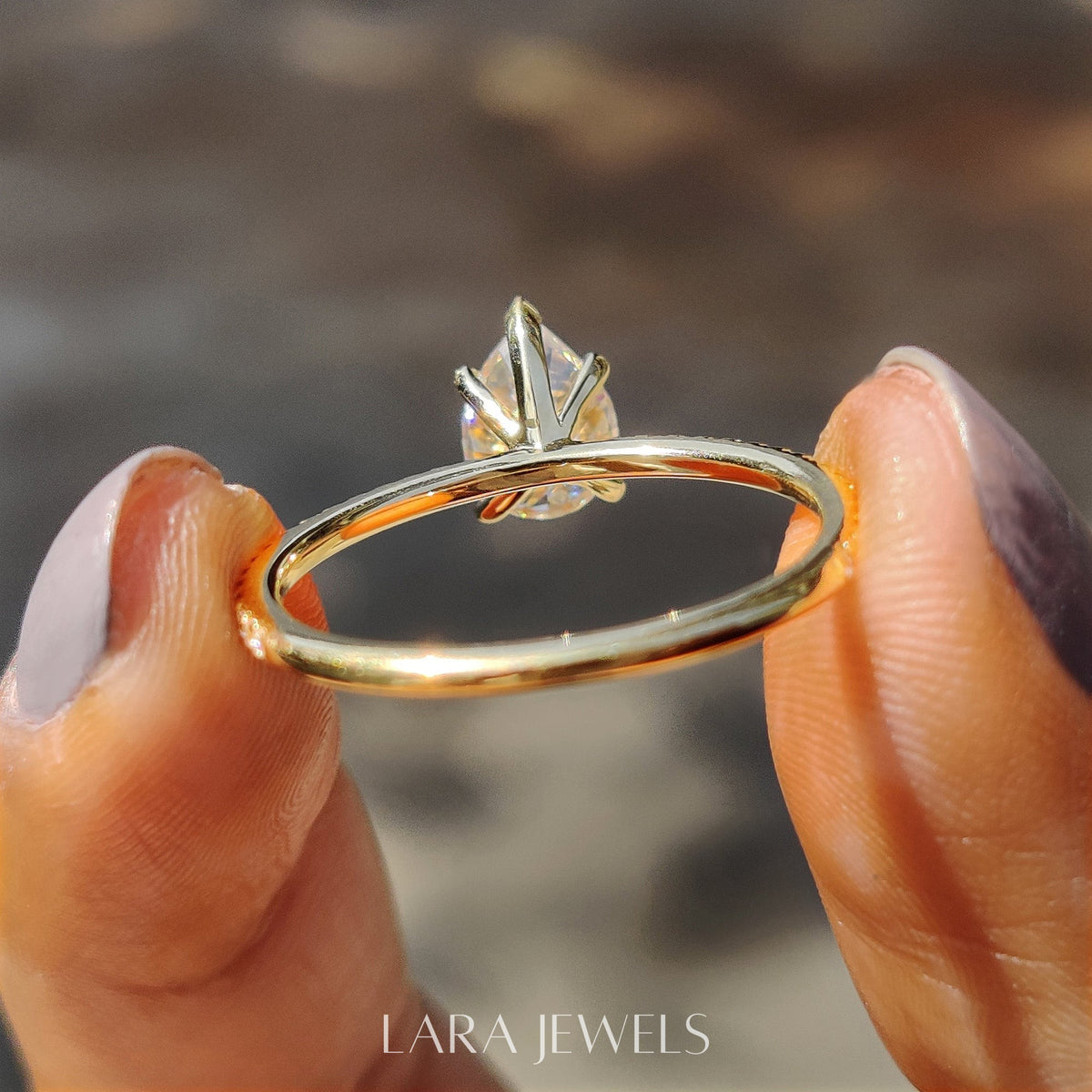Lab grown pear engagement ring in Lara Jewels setting, available in Silver. IGI certified, ethically sourced, handcrafted at Lara Jewels.