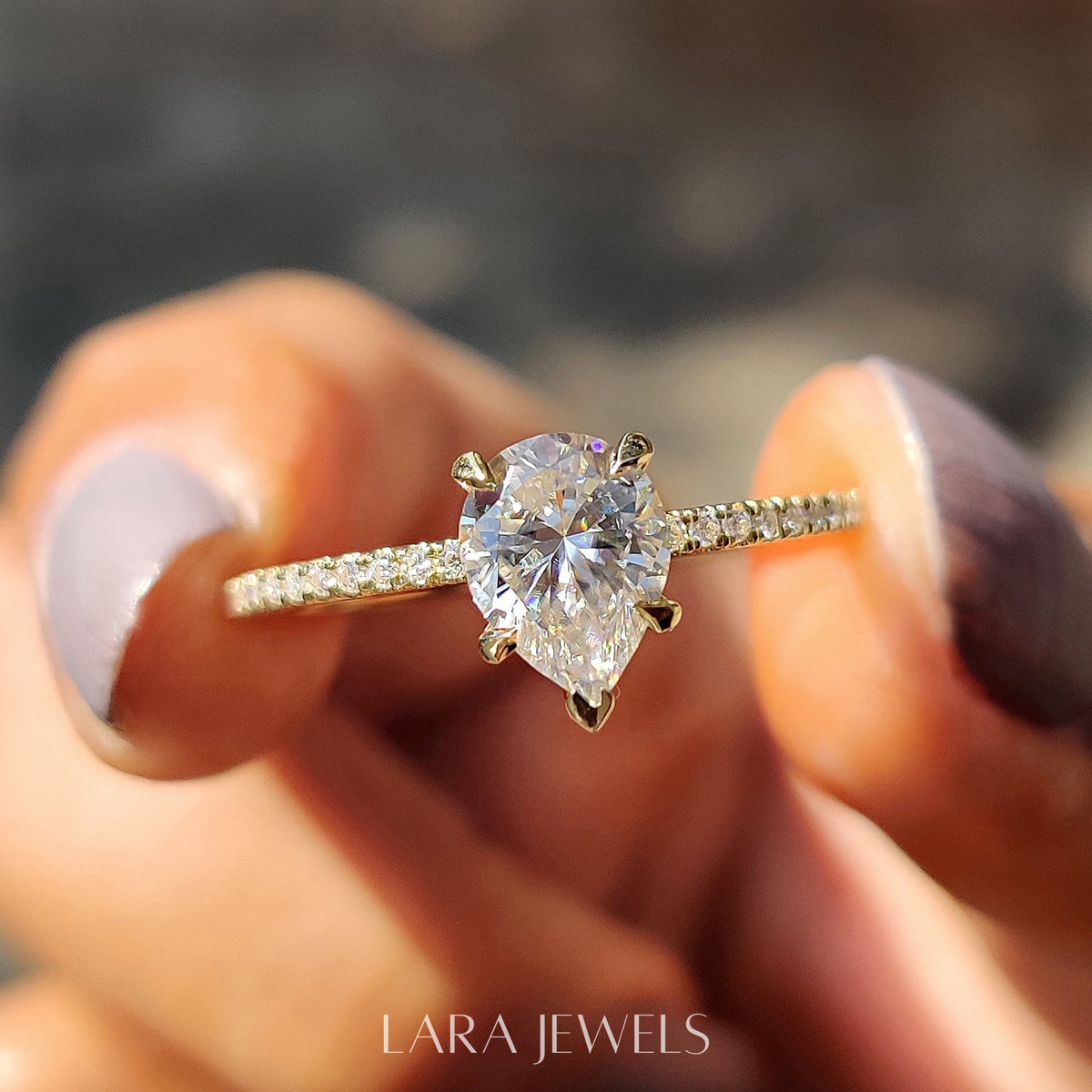 Lab grown pear engagement ring in Lara Jewels setting, available in Silver. IGI certified, ethically sourced, handcrafted at Lara Jewels.