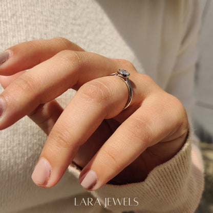 Lab grown round engagement ring in Bezel Solitaire Setting, available in Silver. IGI certified, ethically sourced, handcrafted at Lara Jewels.