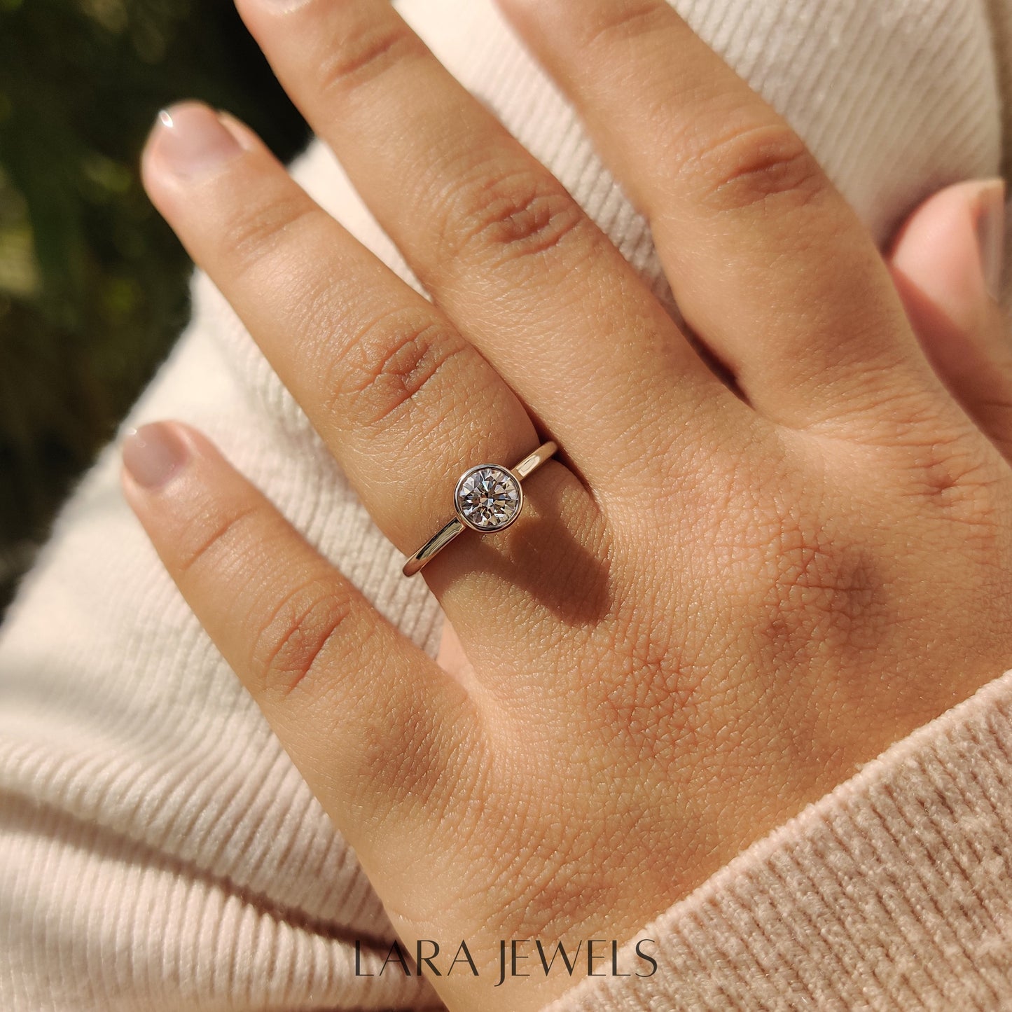 Lab grown round engagement ring in Bezel Solitaire Setting, available in Silver. IGI certified, ethically sourced, handcrafted at Lara Jewels.