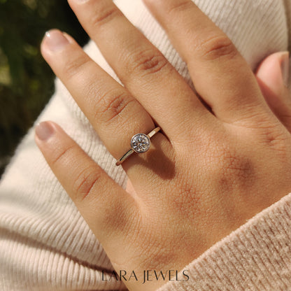 Lab grown round engagement ring in Bezel Solitaire Setting, available in Silver. IGI certified, ethically sourced, handcrafted at Lara Jewels.