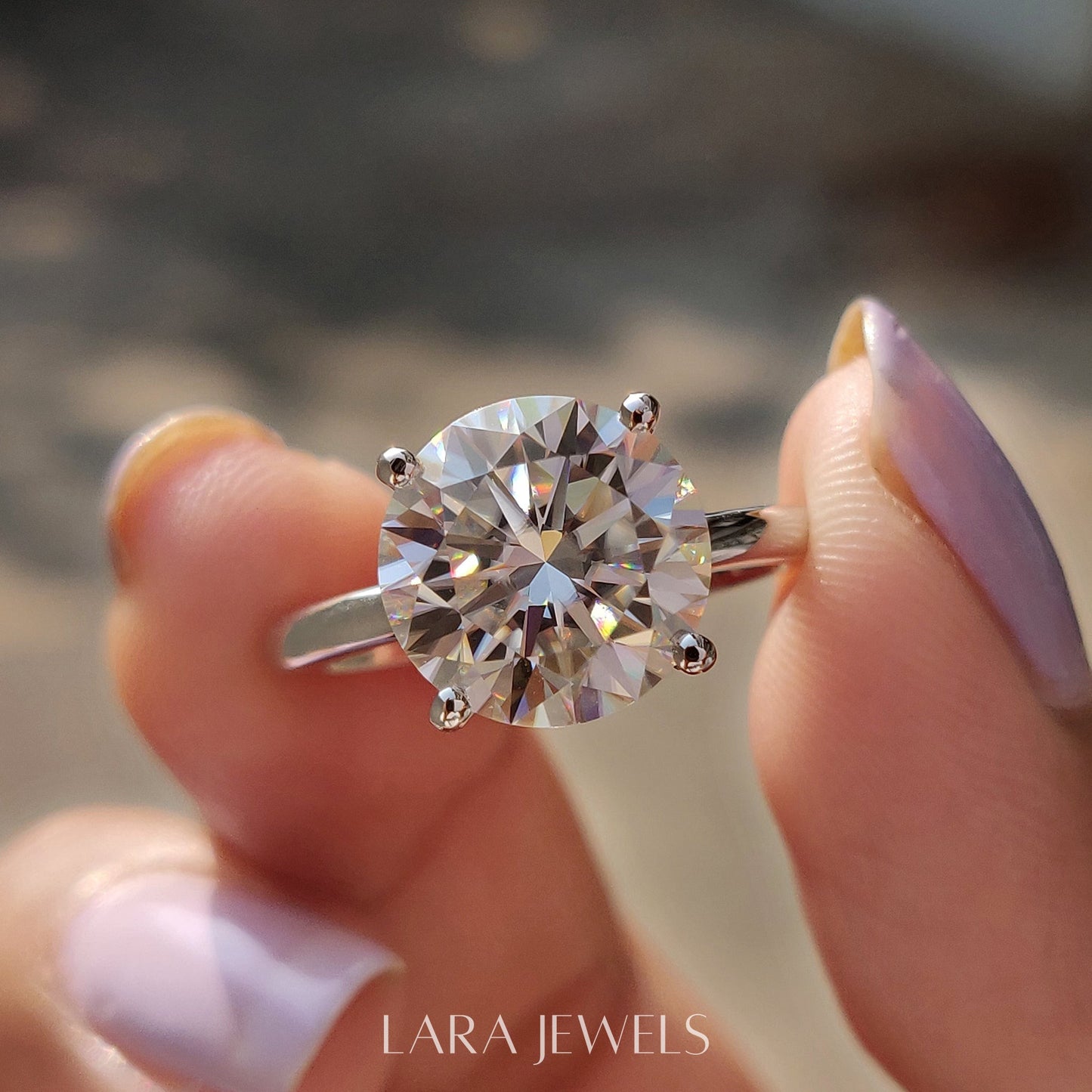 Lab grown round engagement ring in Lara Jewels setting, available in Silver. IGI certified, ethically sourced, handcrafted at Lara Jewels.