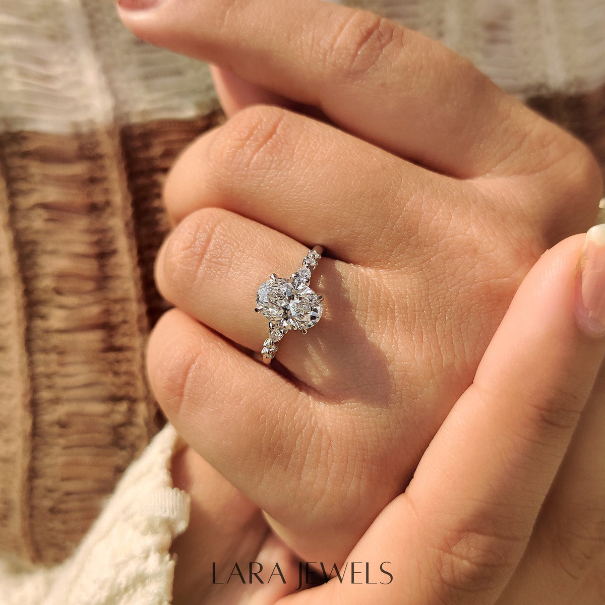 Lab grown oval engagement ring in Lara Jewels setting, available in Silver. IGI certified, ethically sourced, handcrafted at Lara Jewels.