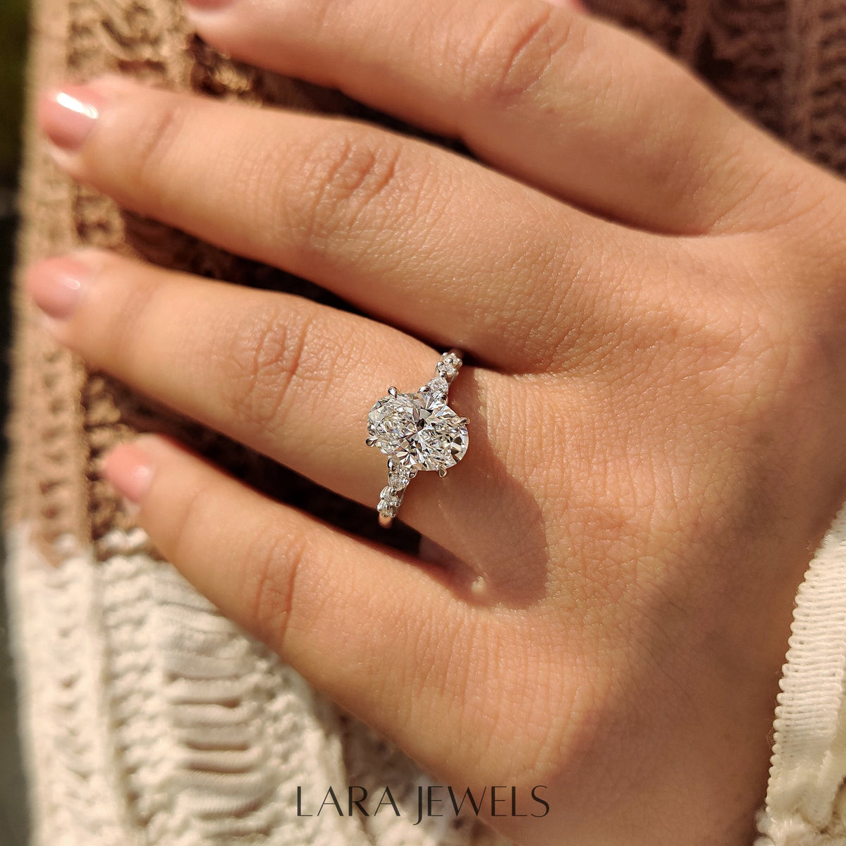 Lab grown oval engagement ring in Lara Jewels setting, available in Silver. IGI certified, ethically sourced, handcrafted at Lara Jewels.