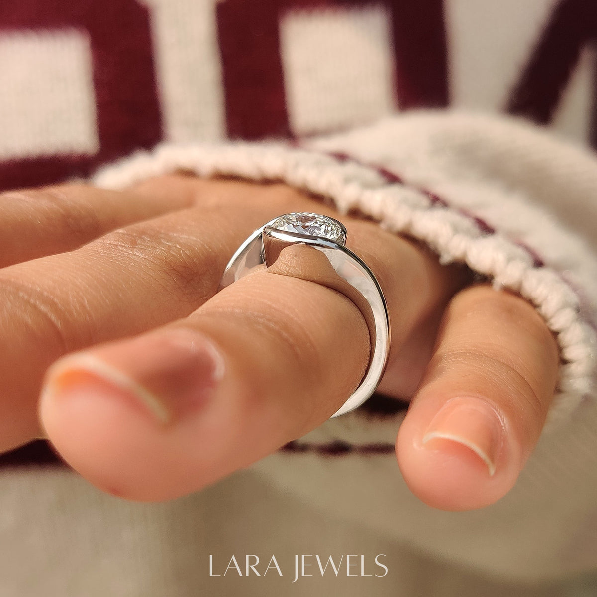 Lab grown diamond engagement ring in Half Bezel, available in Silver. IGI certified, ethically sourced, handcrafted at Lara Jewels.