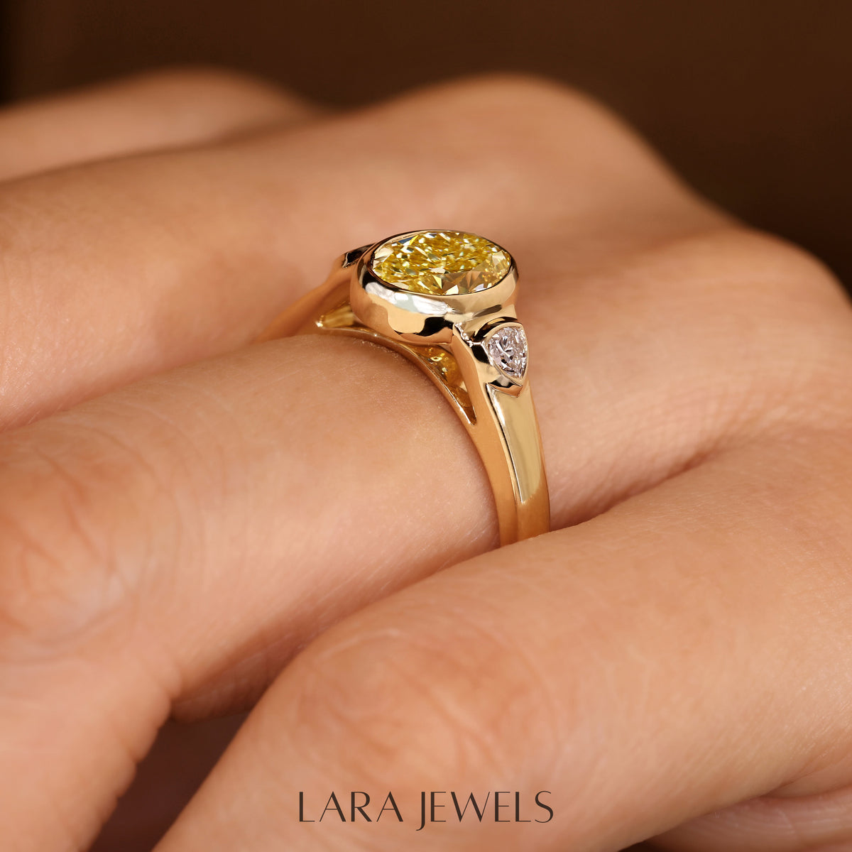 Lab grown oval engagement ring in Trillion Side Stone, available in Silver. IGI certified, ethically sourced, handcrafted at Lara Jewels.