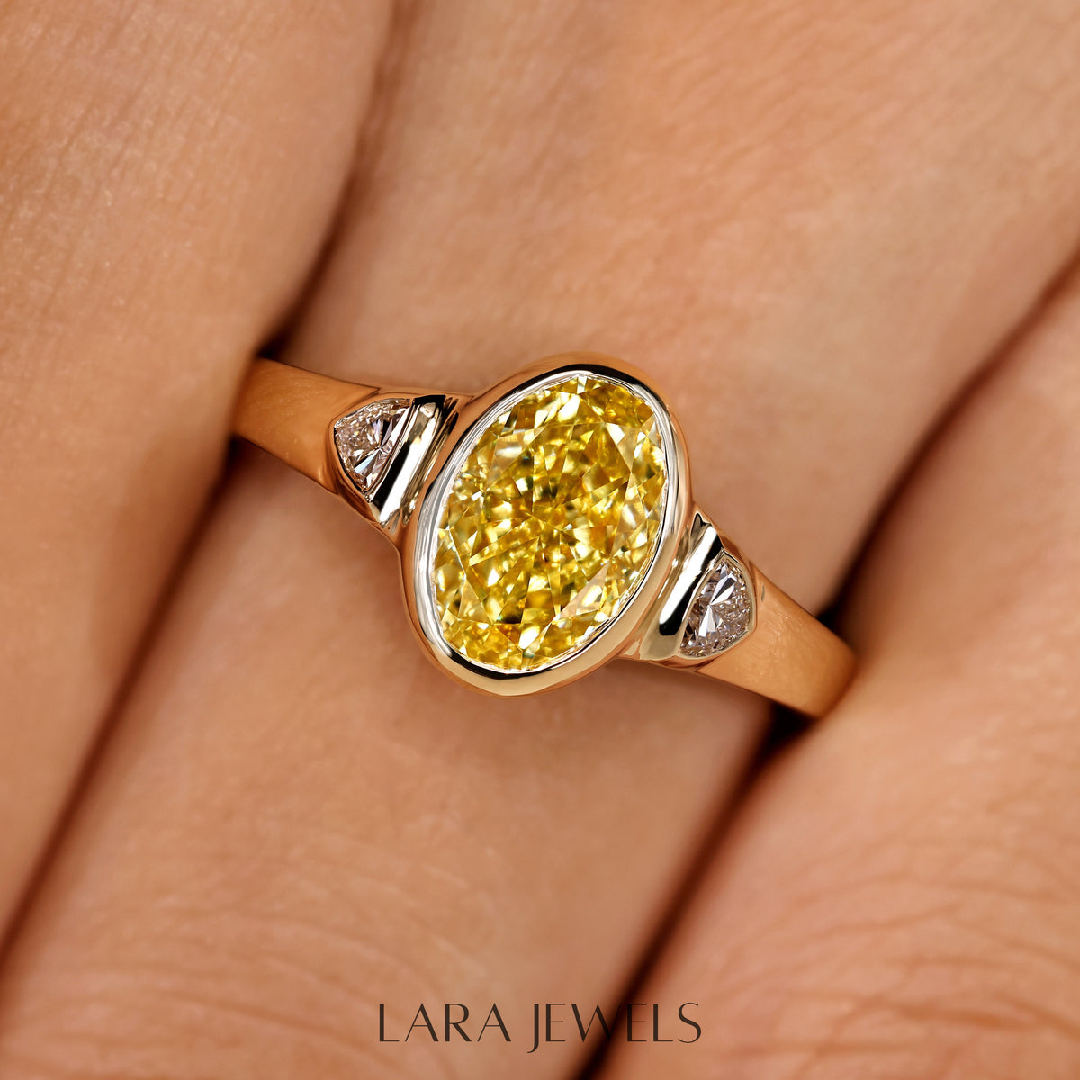 Lab grown oval engagement ring in Trillion Side Stone, available in Silver. IGI certified, ethically sourced, handcrafted at Lara Jewels.