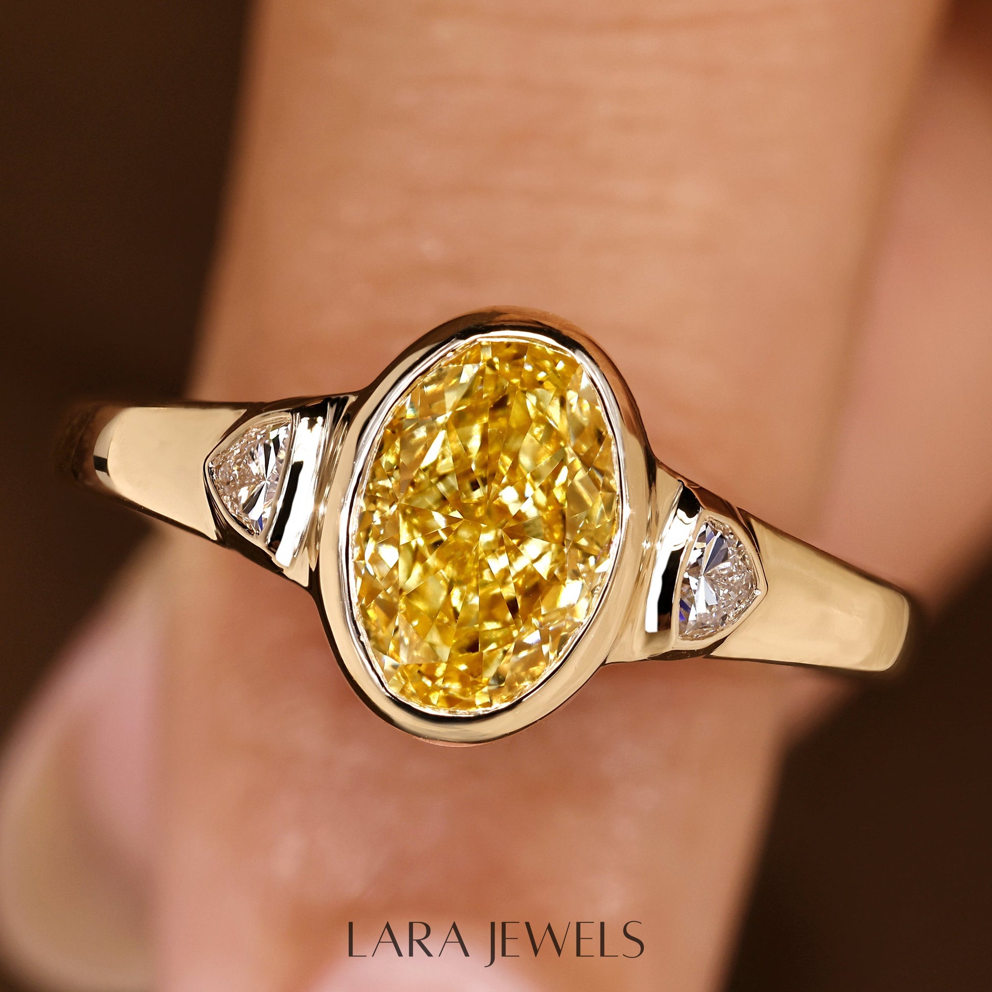Lab grown oval engagement ring in Trillion Side Stone, available in Silver. IGI certified, ethically sourced, handcrafted at Lara Jewels.