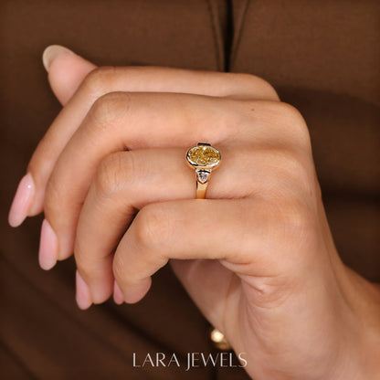 Lab grown oval engagement ring in Trillion Side Stone, available in Silver. IGI certified, ethically sourced, handcrafted at Lara Jewels.