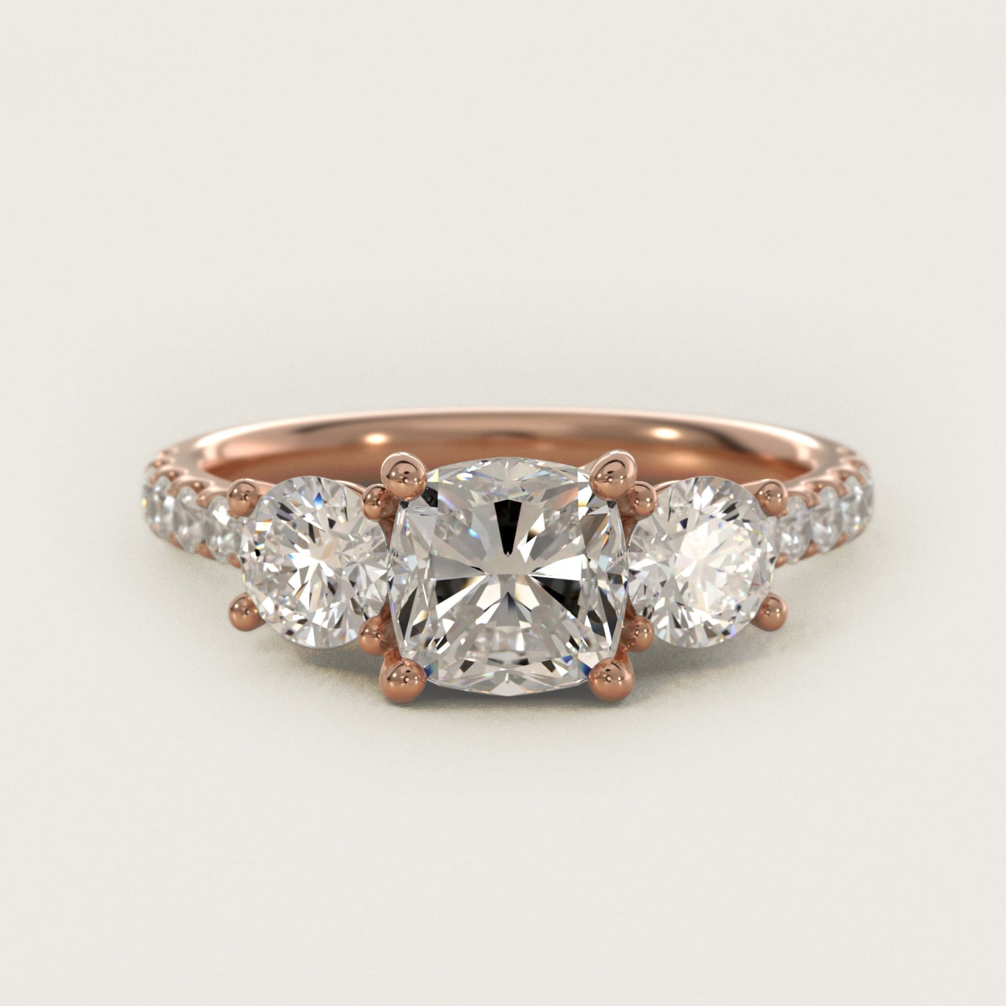 Modern Trellis Three Stone Diamond Engagement in 14k Rose Gold - Cushion Center