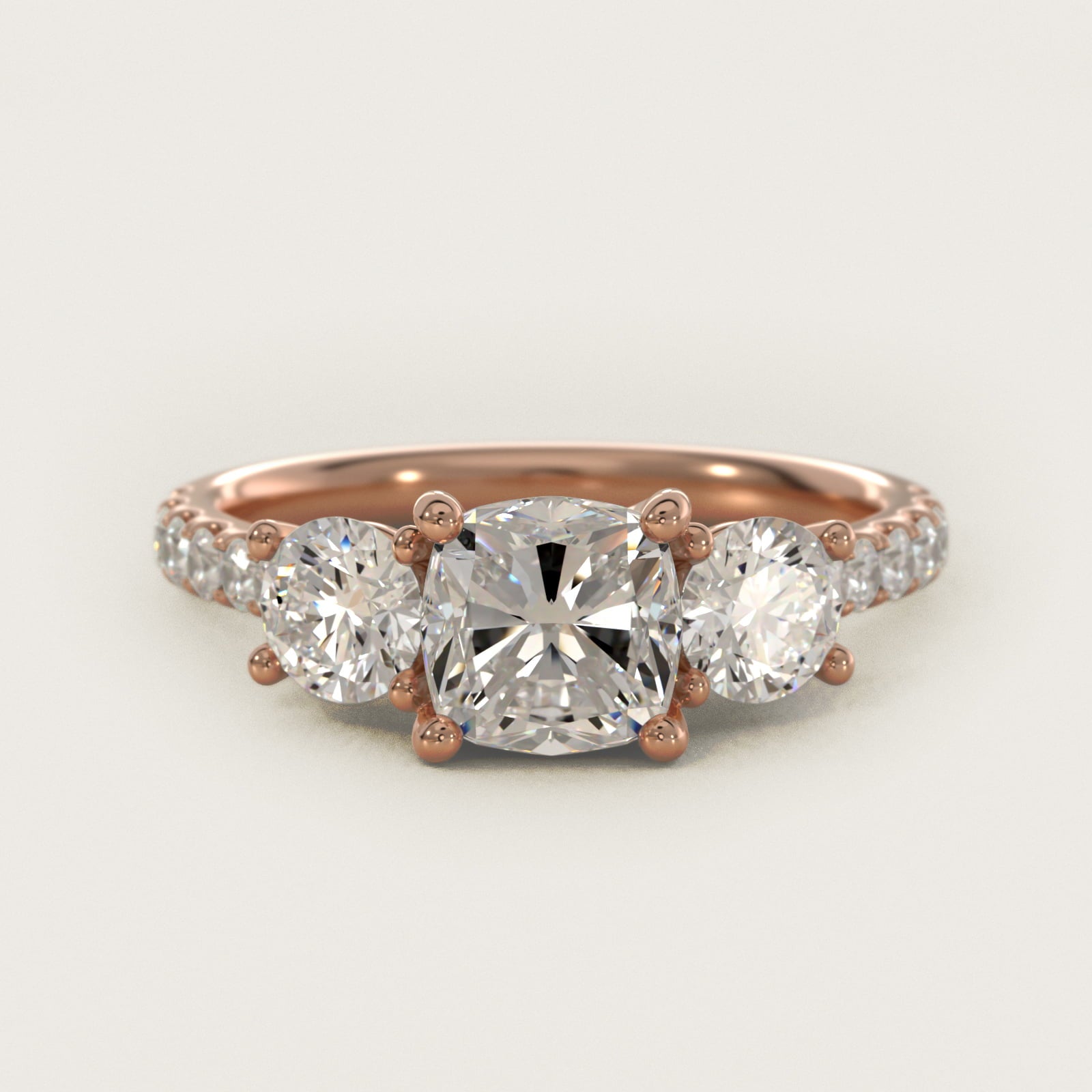 Modern Trellis Three Stone Diamond Engagement in 18k Rose Gold - Cushion Center