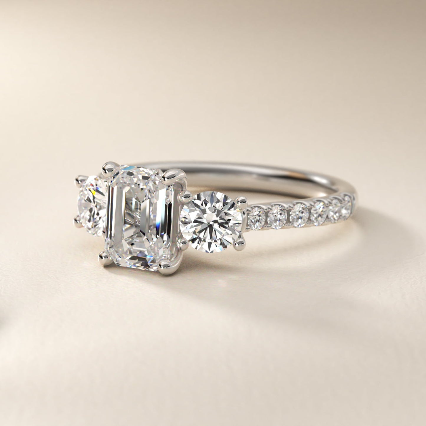 Modern Trellis Three Stone Diamond Engagement in Platinum - Emerald Center