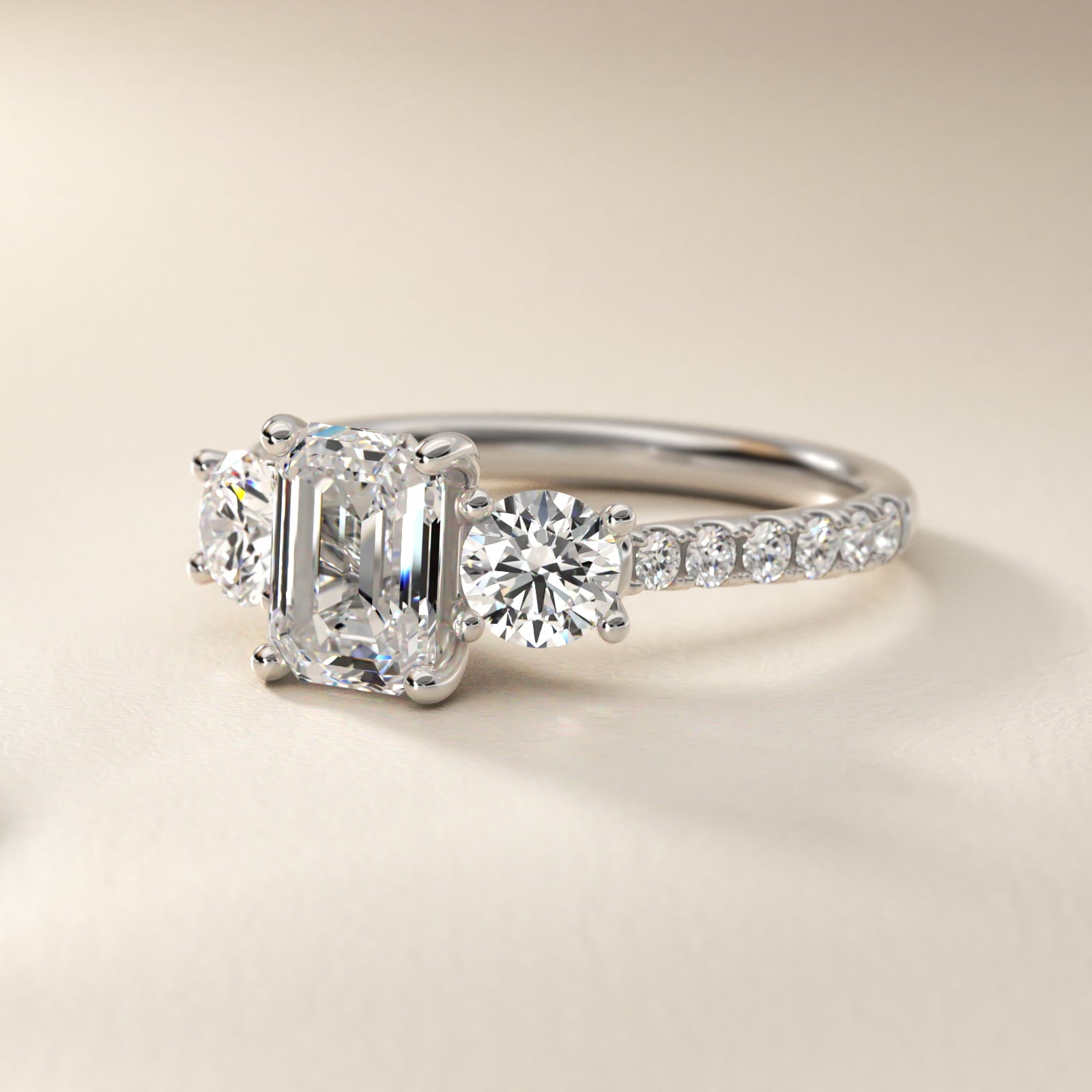 Modern Trellis Three Stone Diamond Engagement in Platinum - Emerald Center
