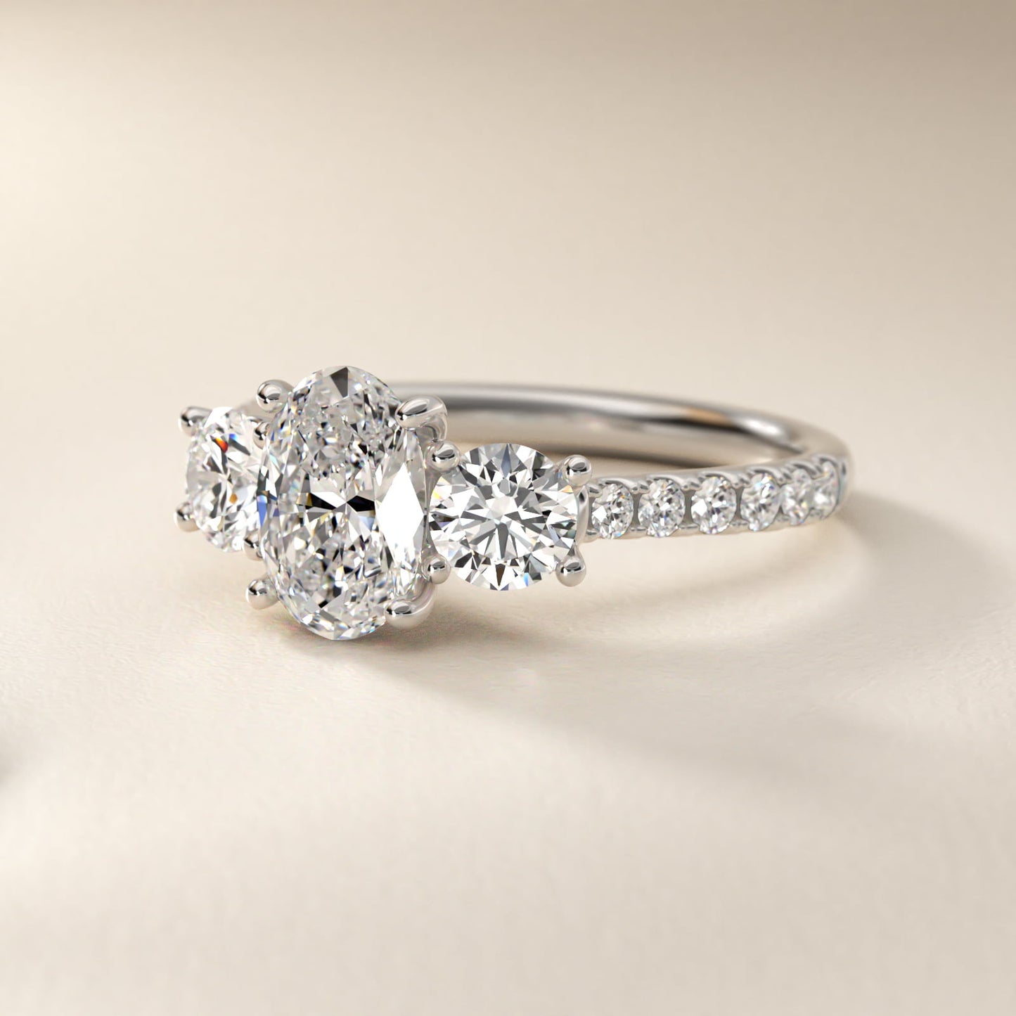 Modern Trellis Three Stone Diamond Engagement in Platinum - Oval Center