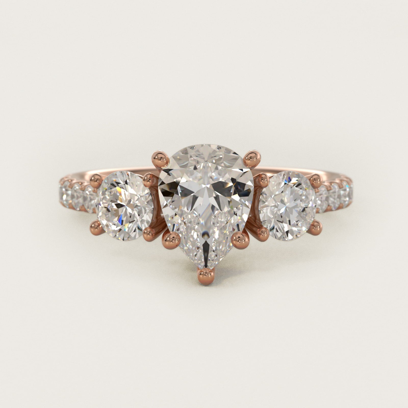 Modern Trellis Three Stone Diamond Engagement in 18k Rose Gold - Pear Center
