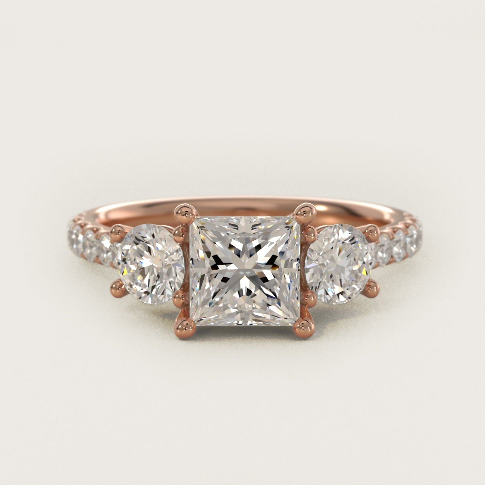 Modern Trellis Three Stone Diamond Engagement in 18k Rose Gold - Princess Center