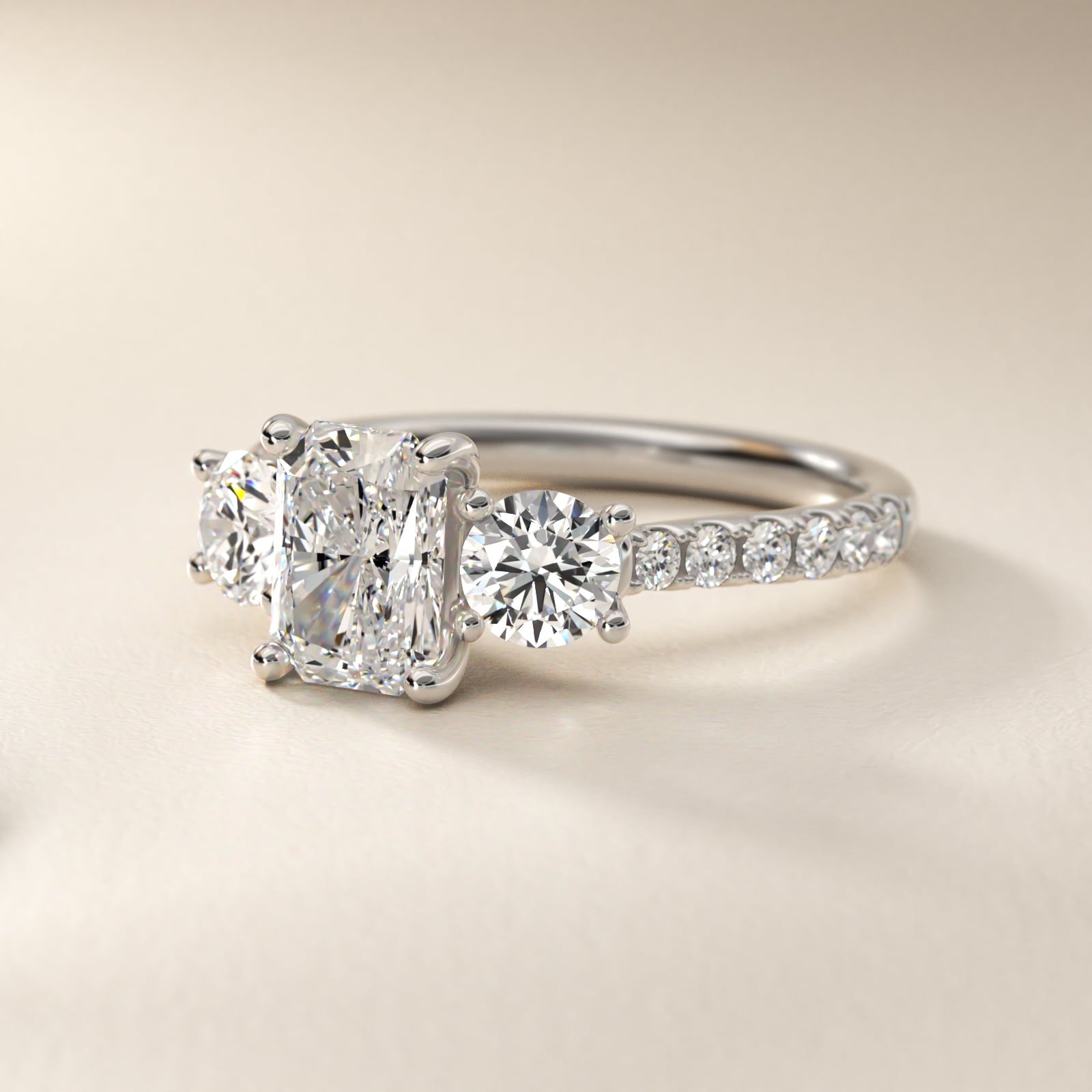 Modern Trellis Three Stone Diamond Engagement in Platinum - Radiant Center