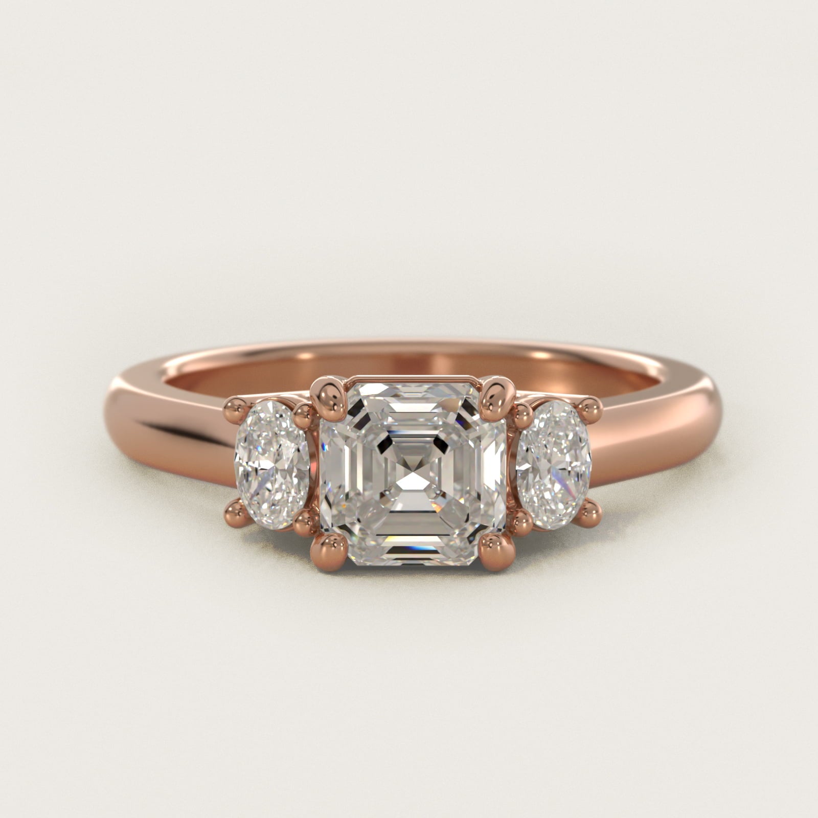 Oval Three-Stone Diamond Engagement Ring in 14k Rose Gold (1/3 ct. tw.) - Asscher Center
