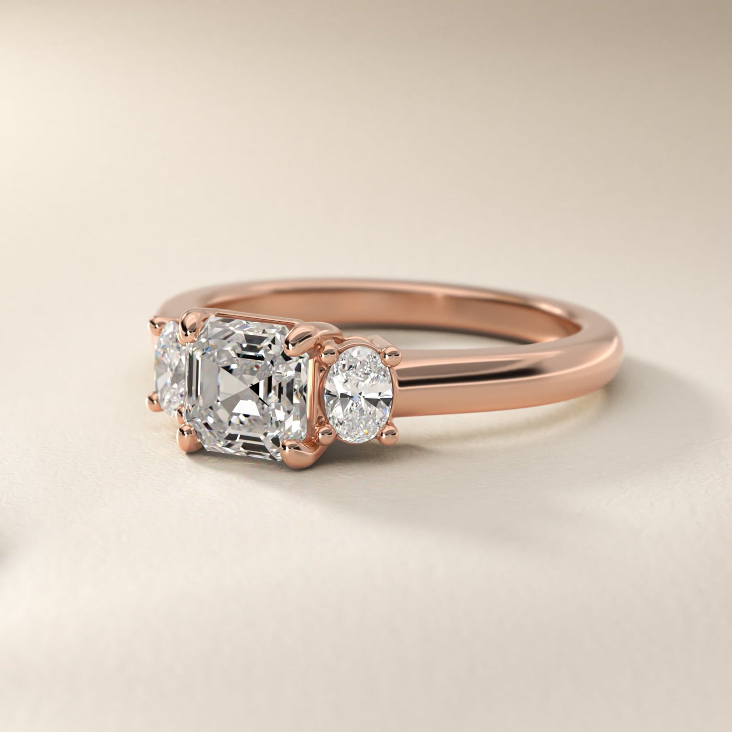 Oval Three-Stone Diamond Engagement Ring in 14k Rose Gold (1/3 ct. tw.) - Asscher Center