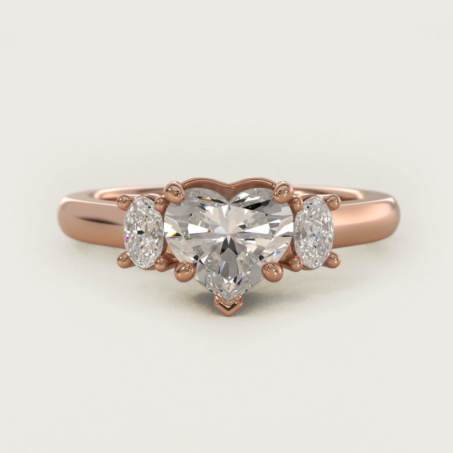 Oval Three-Stone Diamond Engagement Ring in 18k Rose Gold (1/3 ct. tw.) - Heart Center